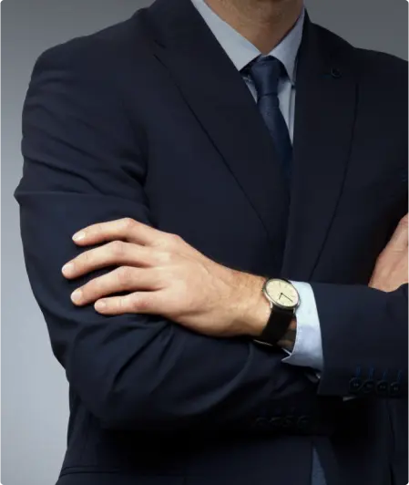 Markham lawyer in a suit with his arms crossed